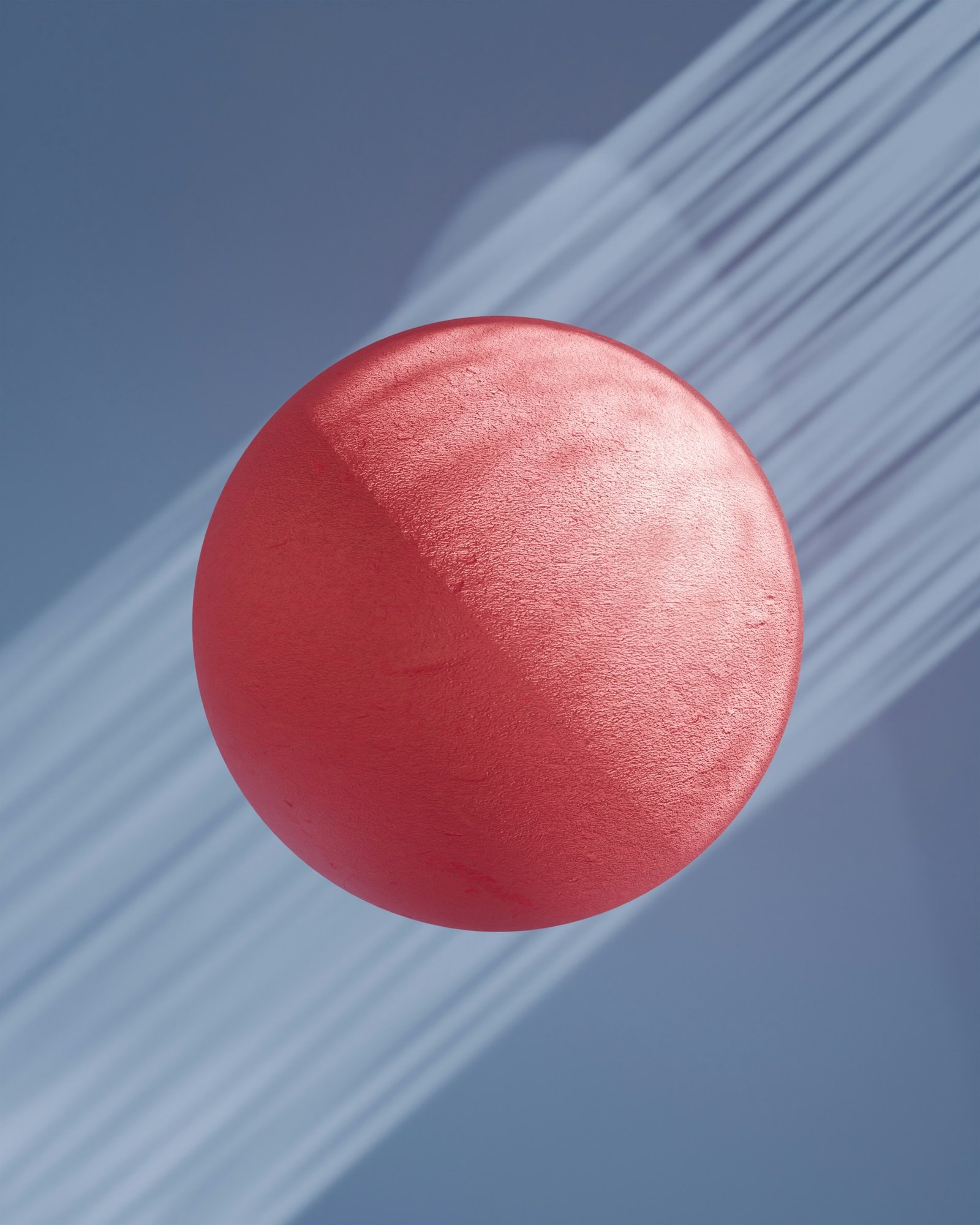 3D render: a coral sphere against a blue-grey backdrop streaked with light